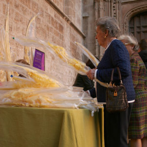 Women buying palms outside the cathedral