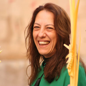 Laughing girl with palms